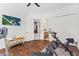 Home gym with modern equipment, wood floors, and bright lighting at 30600 N Pima N Rd # 81, Scottsdale, AZ 85266