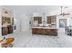 Open-concept kitchen featuring a large island, stainless steel appliances, and a seamless flow to the living areas at 30600 N Pima N Rd # 81, Scottsdale, AZ 85266