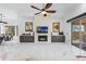 Spacious living room featuring a fireplace, marble floors, and natural light at 30600 N Pima N Rd # 81, Scottsdale, AZ 85266
