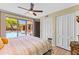 Bright main bedroom with pool view and large closets at 30600 N Pima N Rd # 81, Scottsdale, AZ 85266