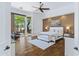 Serene main bedroom featuring a sitting area with outdoor access and ample natural light at 30600 N Pima N Rd # 81, Scottsdale, AZ 85266