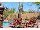 Inviting pool area with comfortable lounge chairs and scenic desert views at 30600 N Pima N Rd # 81, Scottsdale, AZ 85266