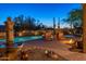 Relaxing desert oasis with a sparkling pool, comfortable lounge chairs, and a charming water feature for ultimate serenity at 30600 N Pima N Rd # 81, Scottsdale, AZ 85266