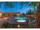 Home features a backyard pool and spa with an outdoor seating area and desert landscaping at 30600 N Pima N Rd # 81, Scottsdale, AZ 85266