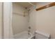 Bathroom featuring a toilet, shower and tub combination at 3131 W Cochise Dr # 144, Phoenix, AZ 85051