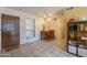 Spacious living area features tiled floors with views from door and window at 3131 W Cochise Dr # 144, Phoenix, AZ 85051