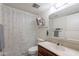 Cozy bathroom with a combined shower and tub, vanity, and modern fixtures at 3131 W Cochise Dr # 269, Phoenix, AZ 85051