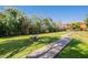 Landscaped yard with vibrant green grass and mature trees, perfect for leisure at 3131 W Cochise Dr # 269, Phoenix, AZ 85051