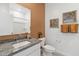 Bathroom featuring white cabinets, granite countertops and neutral walls at 38065 W Frascati Ave, Maricopa, AZ 85138