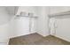 A well-organized walk-in closet with ample hanging space and shelving for storage at 38065 W Frascati Ave, Maricopa, AZ 85138