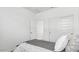 Neutral-toned bedroom featuring sliding closet doors and ample natural light at 38100 W Bello Ln, Maricopa, AZ 85138
