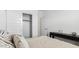 Bedroom with sliding closet doors and a view into the ensuite bathroom at 38100 W Bello Ln, Maricopa, AZ 85138