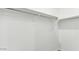 Empty closet with white walls, providing ample storage space at 38100 W Bello Ln, Maricopa, AZ 85138