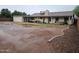 A sprawling backyard featuring a covered patio and ample open space at 405 E Providence Dr, Casa Grande, AZ 85122