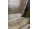 Elegant bathroom featuring a luxurious tile-surround soaking tub and a shower at 405 E Providence Dr, Casa Grande, AZ 85122