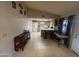 Inviting kitchen featuring wood cabinets, stainless steel appliances, and a breakfast bar for casual dining at 405 E Providence Dr, Casa Grande, AZ 85122