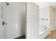 Beautiful bathroom featuring a shower and tub with white subway tile surround at 4050 S Thistle S Dr, Chandler, AZ 85248