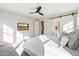 Bright main bedroom with attached bathroom and sliding barn door at 4050 S Thistle S Dr, Chandler, AZ 85248