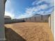 Large, private backyard with block fencing and potential for landscaping and outdoor living at 4167 W Lisa Ln, San Tan Valley, AZ 85144