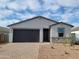 Charming single-story home featuring a two-car garage and low-maintenance landscaping in front at 4167 W Lisa Ln, San Tan Valley, AZ 85144