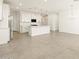 Kitchen with stainless steel appliances, white cabinets, and pendant lighting above a large center island at 4167 W Lisa Ln, San Tan Valley, AZ 85144