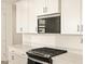 Bright kitchen featuring white cabinetry, stainless steel appliances, and granite countertops at 4167 W Lisa Ln, San Tan Valley, AZ 85144