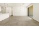 Open living space featuring tile floors, pendant lights, and sliding doors at 4167 W Lisa Ln, San Tan Valley, AZ 85144