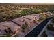 Aerial view of upscale homes near a golf course and desert landscaping, highlighting a beautiful community and location at 41731 N Rolling Green Way, Anthem, AZ 85086