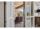 Outdoor patio with a grill, plenty of seating, and stunning desert views at 41731 N Rolling Green Way, Anthem, AZ 85086