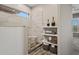 Modern shower with unique tile and wood floors in bathroom at 41731 N Rolling Green Way, Anthem, AZ 85086