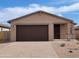 Inviting single-story home with a two-car garage, neutral color palette, and manicured front yard at 4212 W Lisa Ln, San Tan Valley, AZ 85144