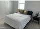 Bright bedroom featuring natural light, modern flooring and a closet at 4602 N 47Th N Ave, Phoenix, AZ 85031