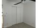 This bedroom features a closet with white doors and modern wood-look flooring at 4602 N 47Th N Ave, Phoenix, AZ 85031
