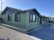 Stylish single-story home with a modern paint scheme, complemented by sleek walkways and a well-maintained gravel yard at 4602 N 47Th N Ave, Phoenix, AZ 85031