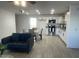 Bright kitchen area with white cabinets, stainless steel appliances, granite countertops, and a cozy dining nook, perfect for modern living at 4602 N 47Th N Ave, Phoenix, AZ 85031
