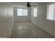 A bright and airy living room with light colored walls and floors at 4602 N 47Th N Ave, Phoenix, AZ 85031