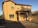 A view of a large yard and a covered patio at 4722 S 238Th Ln, Buckeye, AZ 85326
