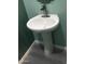 Stylish pedestal sink with modern faucet in a well-lit powder room at 4722 S 238Th Ln, Buckeye, AZ 85326
