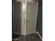 Hallway with two linen closet doors and neutral paint, leading to various rooms in the home at 4722 S 238Th Ln, Buckeye, AZ 85326