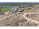 Scenic aerial view of desert community with a golf course, featuring nearby hiking trails and mountain views at 4849 N Camelback Ridge Rd # B403, Scottsdale, AZ 85251