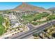 Enjoy scenic golf course views nestled next to residential properties and mountain views at 4849 N Camelback Ridge Rd # B403, Scottsdale, AZ 85251