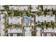 A beautiful aerial view shows the community's resort-style pool and lush landscaping at 5525 E Thomas Rd # K16, Phoenix, AZ 85018
