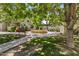 Inviting courtyard fountain surrounded by lush greenery and seating for residents to enjoy the outdoors at 5525 E Thomas Rd # K16, Phoenix, AZ 85018
