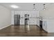 Spacious kitchen featuring white cabinets, stainless appliances, and sleek countertops at 5525 E Thomas Rd # K16, Phoenix, AZ 85018