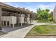 Convenient community mailbox area surrounded by lush greenery and well-maintained walkways at 5525 E Thomas Rd # K16, Phoenix, AZ 85018