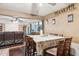 Open dining room seamlessly connects to the living room and kitchen, creating a welcoming and inclusive atmosphere at 5615 W Camelback Rd, Phoenix, AZ 85031