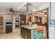 Kitchen showcasing a functional island with a cooktop and modern stainless steel oven, perfect for cooking at 5615 W Camelback Rd, Phoenix, AZ 85031
