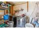 Functional laundry area with modern washer and dryer, plus shelving and space for storage at 5615 W Camelback Rd, Phoenix, AZ 85031