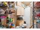 Walk-in pantry with ample shelving and storage, next to a refrigerator at 5615 W Camelback Rd, Phoenix, AZ 85031