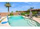 Inviting in-ground pool with basketball hoop, perfect for summer fun in a private backyard oasis at 5615 W Camelback Rd, Phoenix, AZ 85031